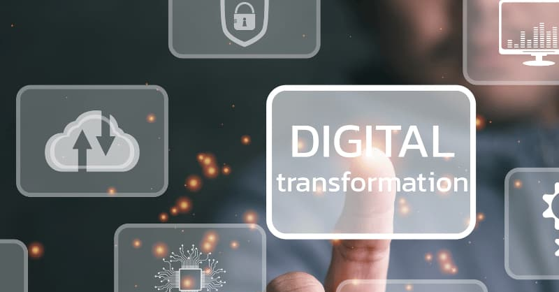 A man presses a digital transformation button